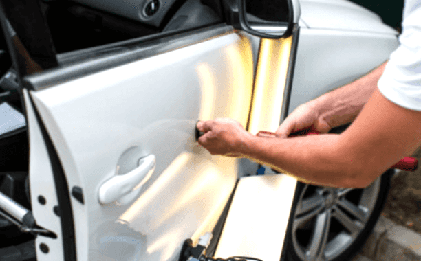 repairing-car-dent-after-the-accident-by-paintless-dent-repair